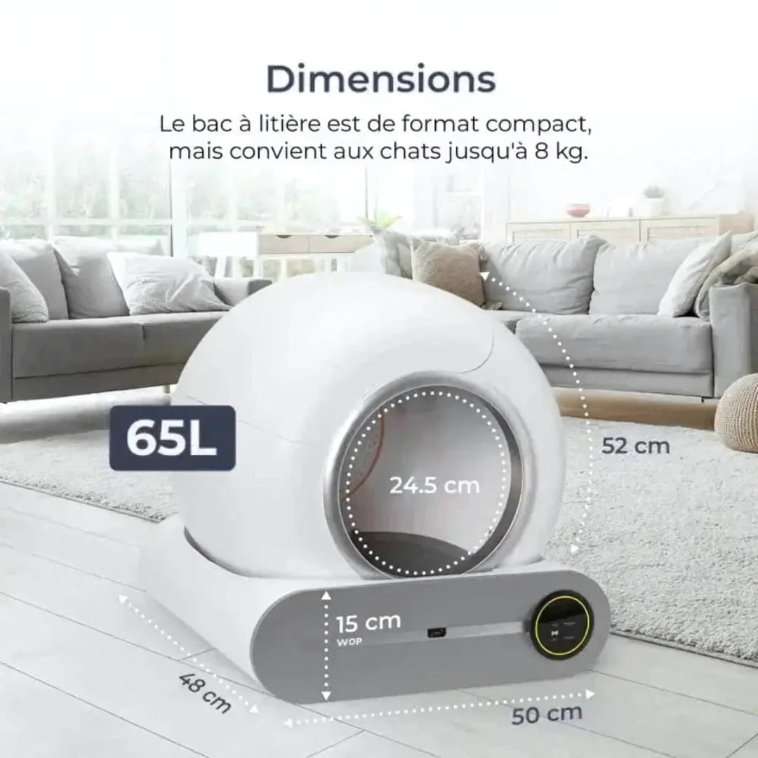 image de la litière autonettoyante avec les dimensions écrites sur chaque cotés dans un salon à coté d'un canapé