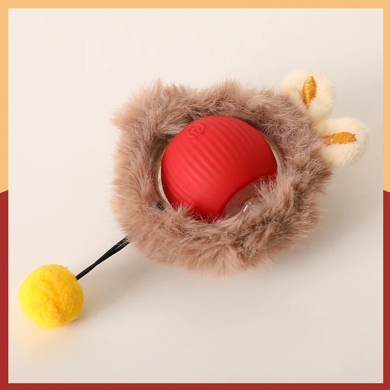 Jouet pour chat interactif avec balle motorisée rouge en silicone strié et housse en peluche marron douce. Ce jouet chat automatique est équipé d'une tige flexible avec un pompon jaune pour stimuler l'instinct de prédation. Un accessoire technologique unique parmi les jouet animaux pour offrir un exercice physique complet et autonome à votre félin.