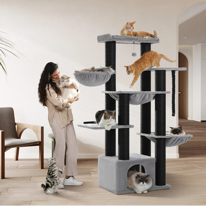 Arbre à chat géant pour 6 chats avec hamacs suspendus, niches douillettes et poteaux à griffer en sisal renforcé.