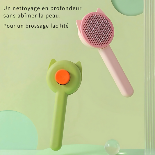 Brosse de toilettage autonettoyante pour chat avec picots arrondis pour un massage doux, disponible en rose et vert pastel, dotée d'un bouton poussoir pour un retrait facile des poils.