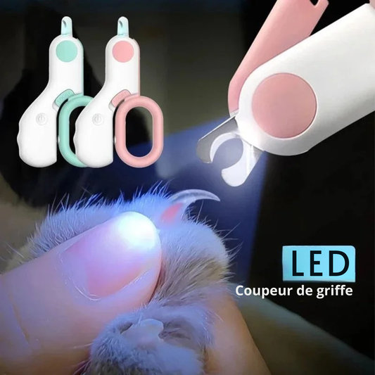 Coupe-griffes ergonomique pour chat avec lumière LED intégrée éclairant la veine de la griffe pour une coupe sécurisée, disponible en rose et vert pastel.