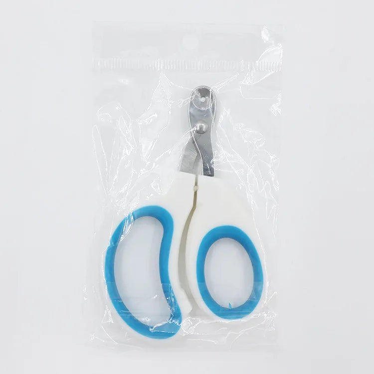 Coupe-griffes de précision pour chat sous emballage scellé, modèle blanc et bleu avec lame perforée en acier inoxydable pour une coupe sécurisée sans douleur.