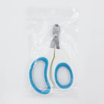 Coupe-griffes de précision pour chat sous emballage scellé, modèle blanc et bleu avec lame perforée en acier inoxydable pour une coupe sécurisée sans douleur.