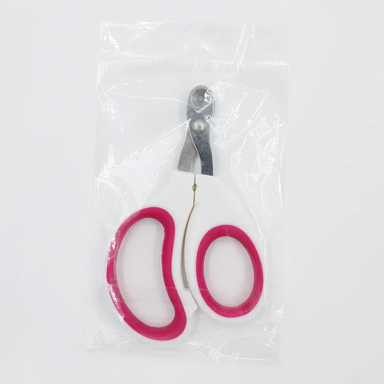 Coupe-griffes de précision pour chat sous emballage scellé, modèle blanc et rose avec lame perforée en acier inoxydable pour une coupe sécurisée sans douleur.