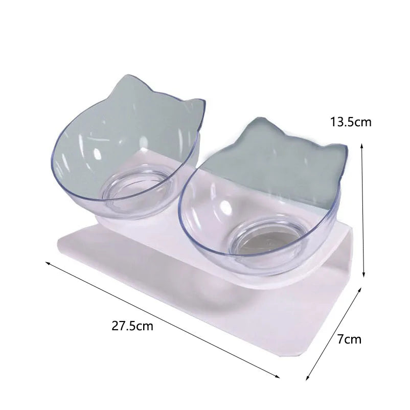 Infographie des dimensions d'une gamelle pour chat double inclinée : 27,5 cm de long avec deux bols transparents design oreilles de chat. Cette gamelle chat orthopédique sur support blanc assure un confort cervical optimal et facilite la digestion grâce à son inclinaison de 15 degrés. Une gamelle duo ergonomique aux mesures précises pour votre intérieur.