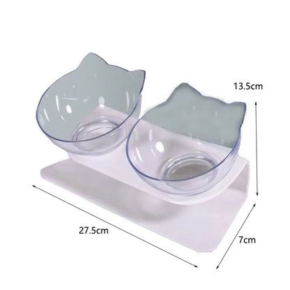 Infographie des dimensions d'une gamelle pour chat double inclinée : 27,5 cm de long avec deux bols transparents design oreilles de chat. Cette gamelle chat orthopédique sur support blanc assure un confort cervical optimal et facilite la digestion grâce à son inclinaison de 15 degrés. Une gamelle duo ergonomique aux mesures précises pour votre intérieur.