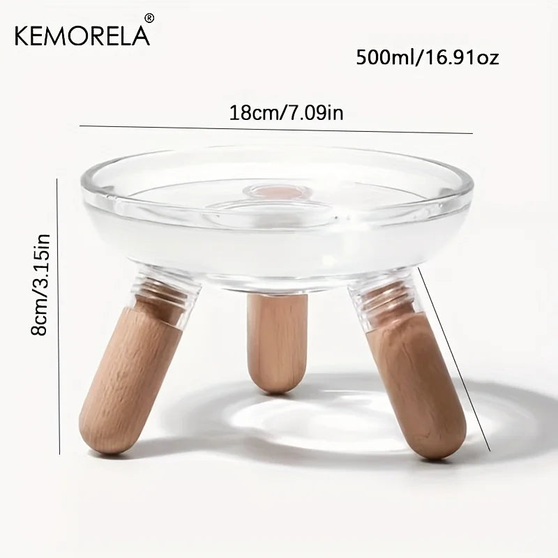 Schéma technique de la gamelle surélevée Kemorela indiquant une capacité de 500 ml, un diamètre de 18 cm et une hauteur ergonomique de 8 cm, avec support en bois et bol en verre.
