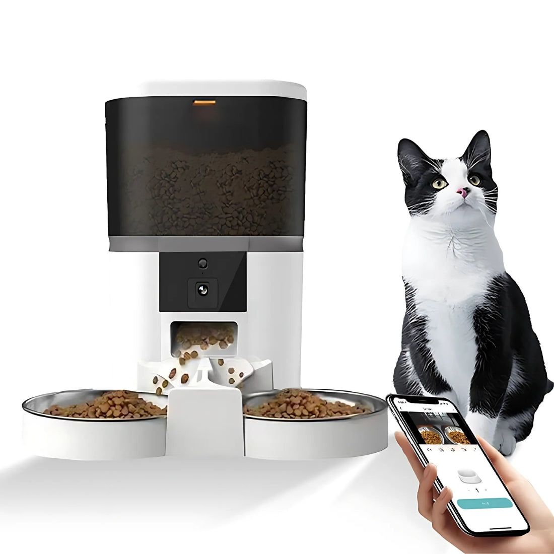 Distributeur automatique de croquettes blanc avec caméra HD intégrée et double gamelle en inox, pilotable à distance via application smartphone, présenté avec un chat noir et blanc.