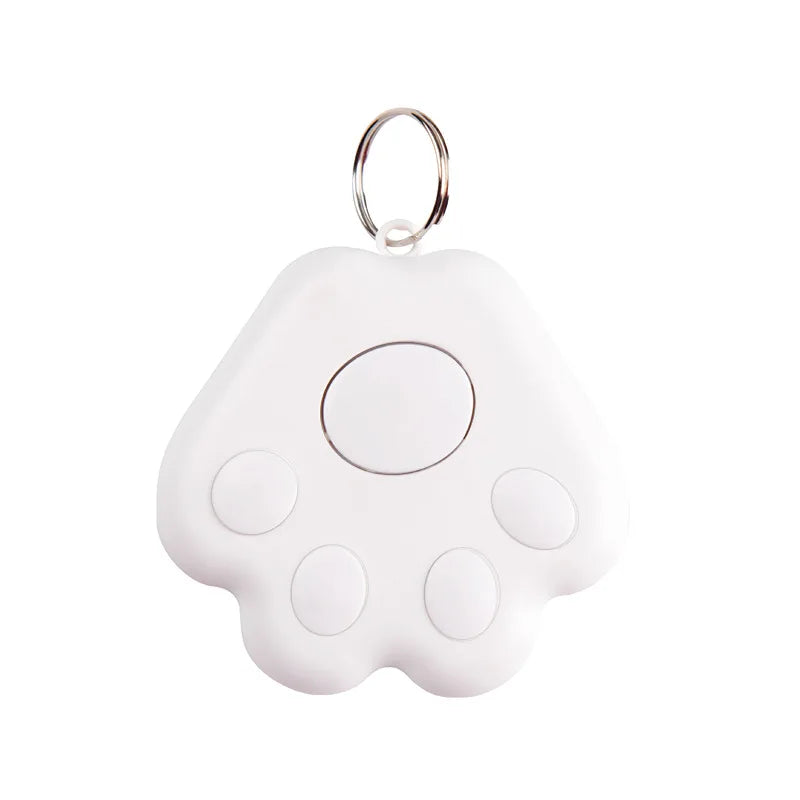 Traceur pour collier gps chat blanc en forme de patte utilisé comme déclencheur à distance pour prendre un autoportrait de groupe sur smartphone. Le visuel illustre la fonction « Capturez facilement le plus beau moment » avec option de prise de vue en rafale. Un dispositif ultra-léger et pratique, idéal comme accessoire de collier gps pour chaton ou pour vos sorties entre amis avec ce collier gps polyvalent.