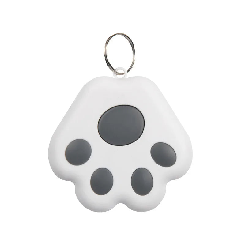 Traceur pour collier gps chat blanc en forme de patte utilisé comme déclencheur à distance pour prendre un autoportrait de groupe sur smartphone. Le visuel illustre la fonction « Capturez facilement le plus beau moment » avec option de prise de vue en rafale. Un dispositif ultra-léger et pratique, idéal comme accessoire de collier gps pour chaton ou pour vos sorties entre amis avec ce collier gps polyvalent.
