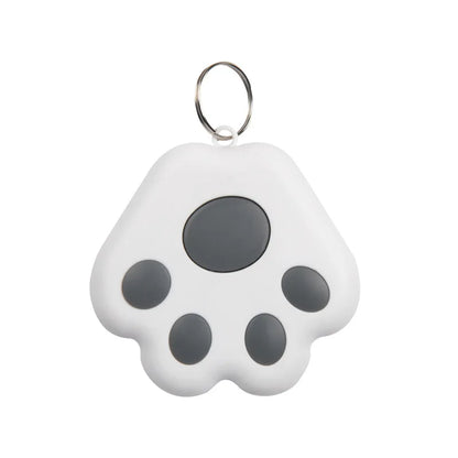 Traceur pour collier gps chat blanc en forme de patte utilisé comme déclencheur à distance pour prendre un autoportrait de groupe sur smartphone. Le visuel illustre la fonction « Capturez facilement le plus beau moment » avec option de prise de vue en rafale. Un dispositif ultra-léger et pratique, idéal comme accessoire de collier gps pour chaton ou pour vos sorties entre amis avec ce collier gps polyvalent.