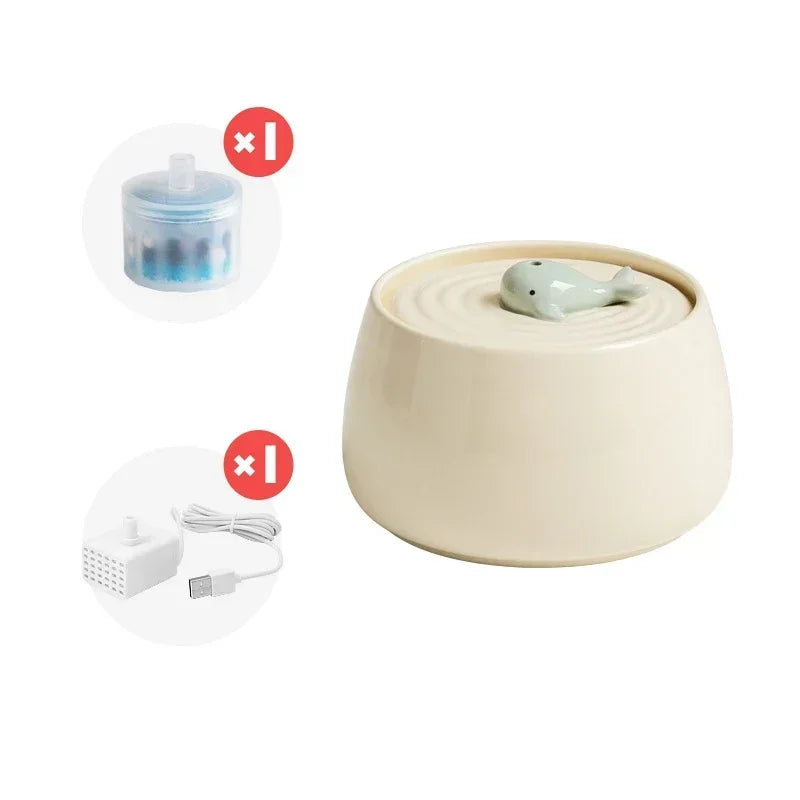 Kit complet fontaine à eau pour chat en céramique crème de style zen, comprenant une pompe à eau USB silencieuse et un élément filtrant purificateur.