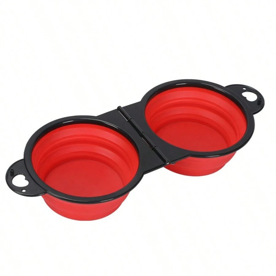 Gamelle pliable double rouge et noire en silicone pour chat et chien. Accessoire Les Trésors d'Owka : gamelle pliable pour chat compacte et portable pour le voyage. Gamelle voyage 2-en-1 idéale pour servir eau et croquettes en extérieur.