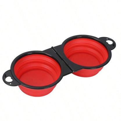 Gamelle pliable double rouge et noire en silicone pour chat et chien. Accessoire Les Trésors d'Owka : gamelle pliable pour chat compacte et portable pour le voyage. Gamelle voyage 2-en-1 idéale pour servir eau et croquettes en extérieur.