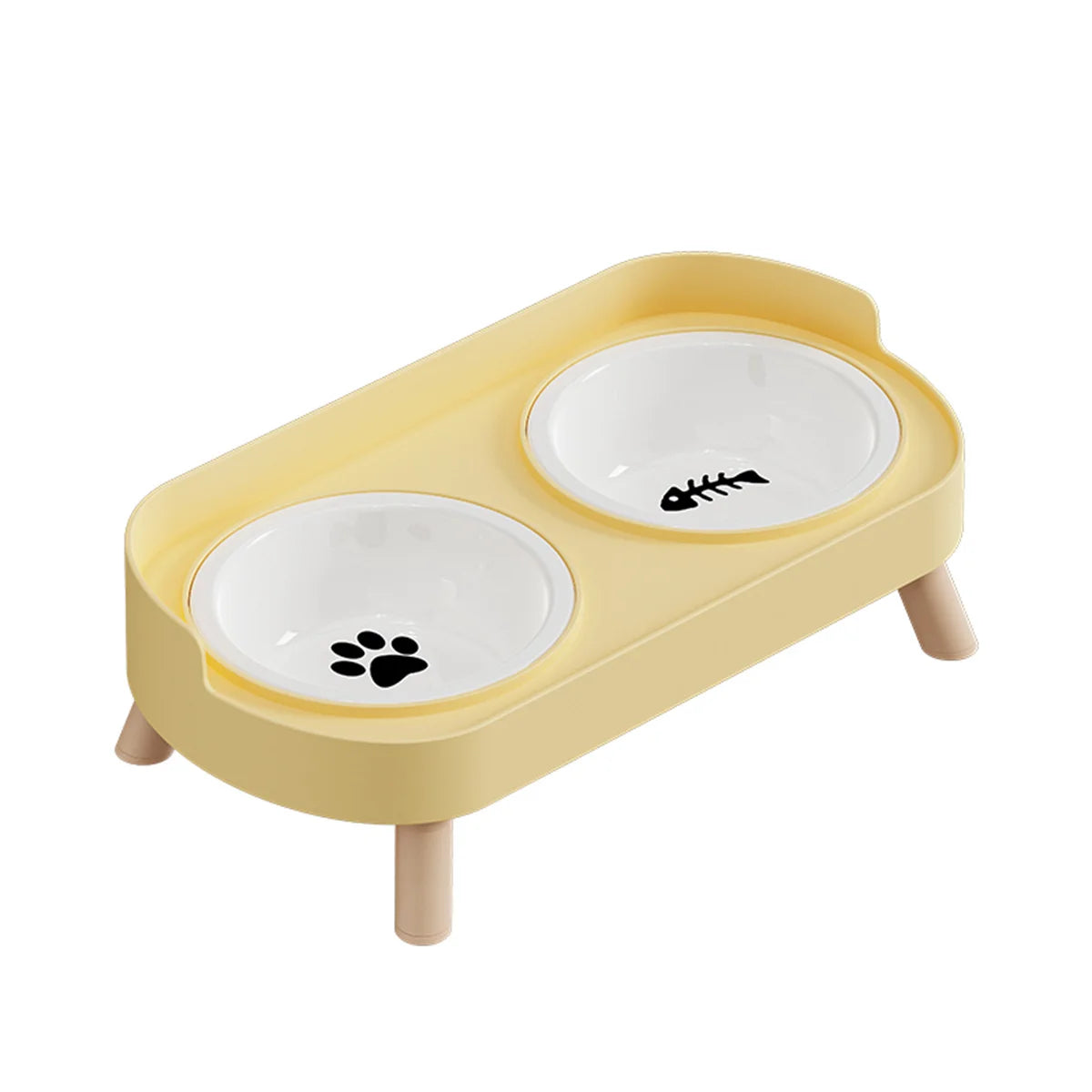 Gamelle pour chat double surélevée au design scandinave jaune pastel avec bols amovibles en céramique blanche et pieds en bois clair. Cette gamelle chat orthopédique décorée d'une patte et d'une arête de poisson assure un confort cervical optimal et une hygiène parfaite pour votre animal. Une gamelle duo robuste et élégante aux finitions premium pour votre intérieur.