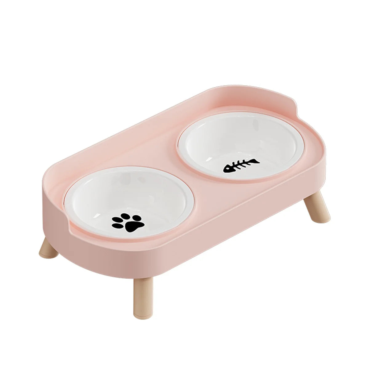 Gamelle pour chat double surélevée au design scandinave rose poudré avec bols amovibles en céramique blanche et pieds en bois clair. Cette gamelle chat orthopédique décorée d'une patte et d'une arête de poisson assure un confort cervical optimal et une hygiène parfaite. Une gamelle duo robuste et élégante aux finitions premium pour votre animal."