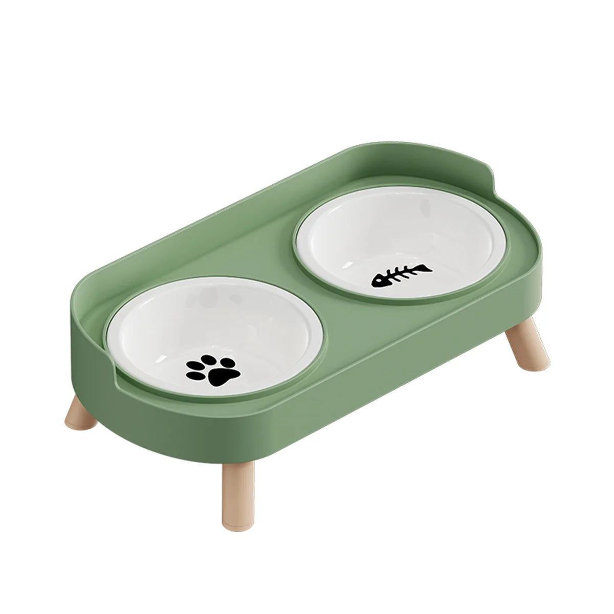 Gamelle pour chat double surélevée au design scandinave vert sauge avec bols amovibles en céramique blanche et pieds en bois clair. Cette gamelle chat orthopédique décorée d'une patte et d'une arête de poisson assure un confort cervical optimal et une hygiène parfaite. Une gamelle duo robuste et élégante aux finitions premium pour votre animal.