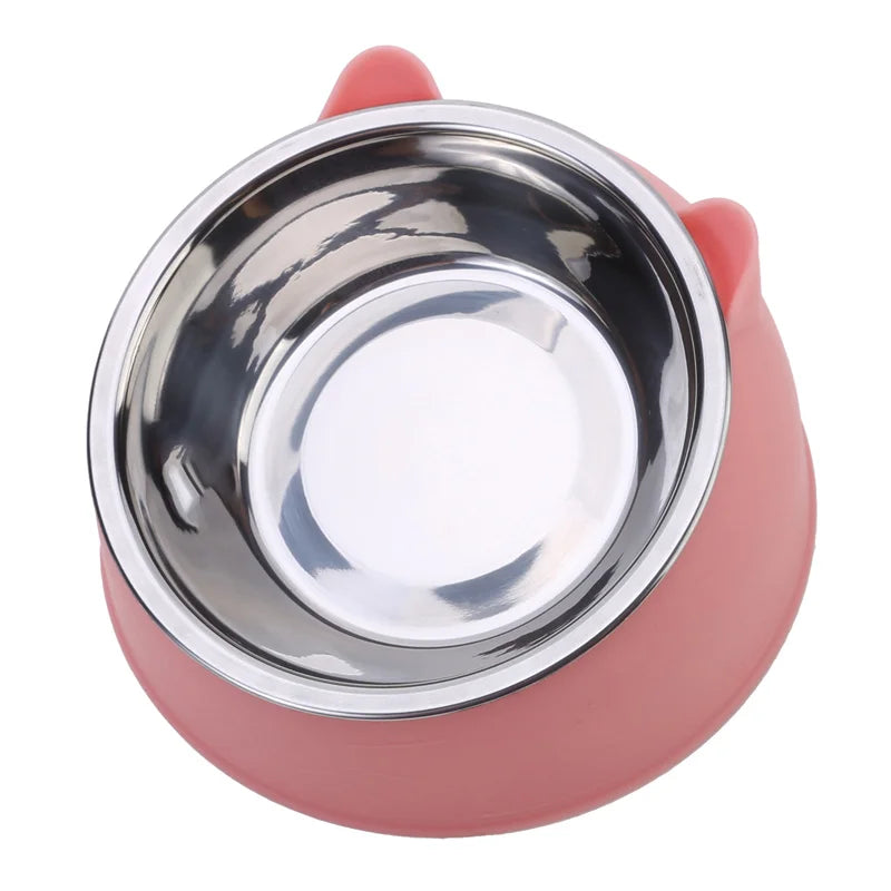 Gamelle pour chat inclinée 15° en acier inoxydable avec support ergonomique rose design oreilles de chat. Cette gamelle chat orthopédique haut de gamme assure un confort digestif optimal et une hygiène parfaite. La meilleure gamelle anti-vomi pour le bien-être de votre animal.