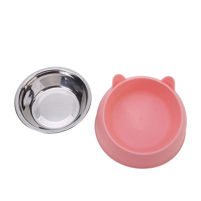 Gamelle pour chat inclinée 15° en acier inoxydable avec support ergonomique rose design oreilles de chat. Cette gamelle chat orthopédique haut de gamme assure un confort digestif optimal et une hygiène parfaite. La meilleure gamelle anti-vomi pour le bien-être de votre animal.