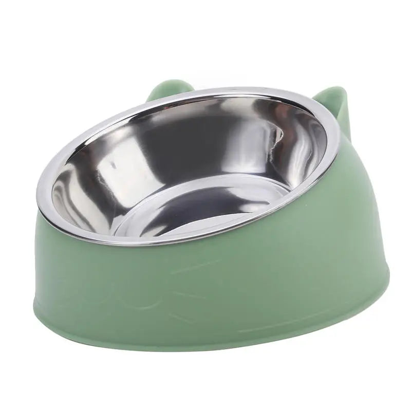 Gamelle pour chat inclinée 15° en acier inoxydable avec support ergonomique vert pastel design oreilles de chat. Cette gamelle chat orthopédique haut de gamme assure un confort digestif optimal et une hygiène parfaite grâce à son bol en inox amovible. La meilleure gamelle anti-vomi élégante pour le bien-être de votre animal.