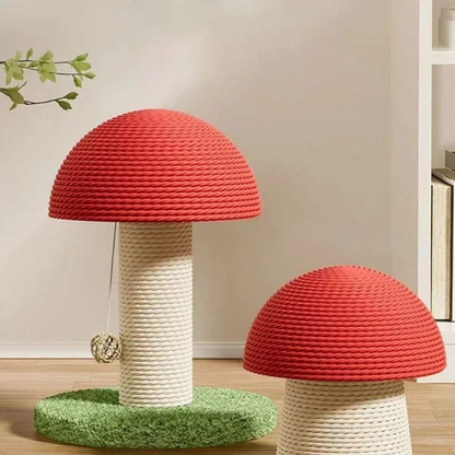 Duo de griffoirs pour chat en forme de champignons avec chapeaux rouges en sisal tressé et pieds blancs, incluant un jouet suspendu, installés dans un intérieur moderne.