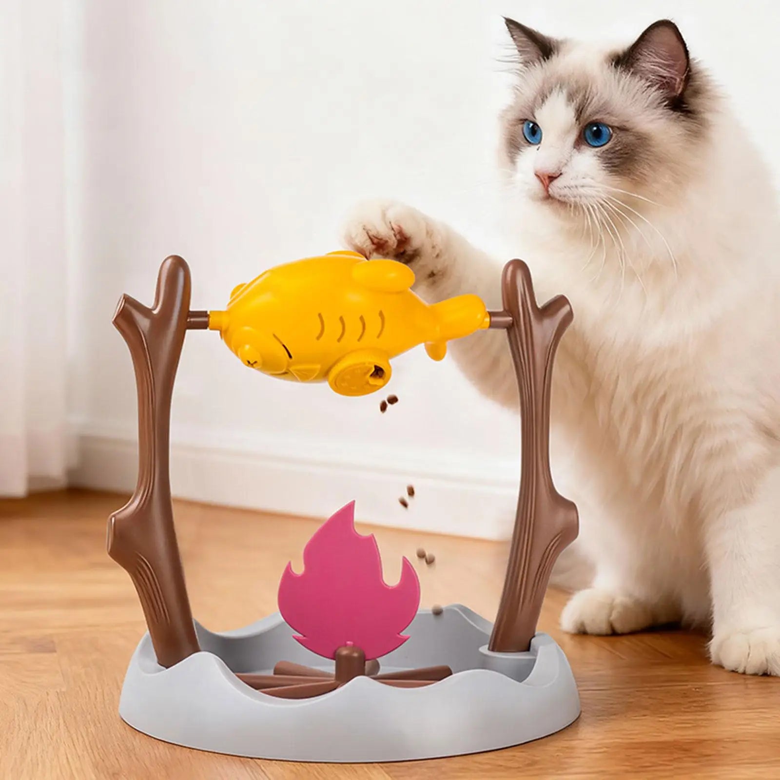 Jeux anti glouton chat interactif en forme de poisson. Ce distributeur de croquettes ludique sert de gamelle anti glouton mobile pour stimuler l'instinct de chasse. Une gamelle glouton amusante qui transforme le repas en jeux anti glouton chat.