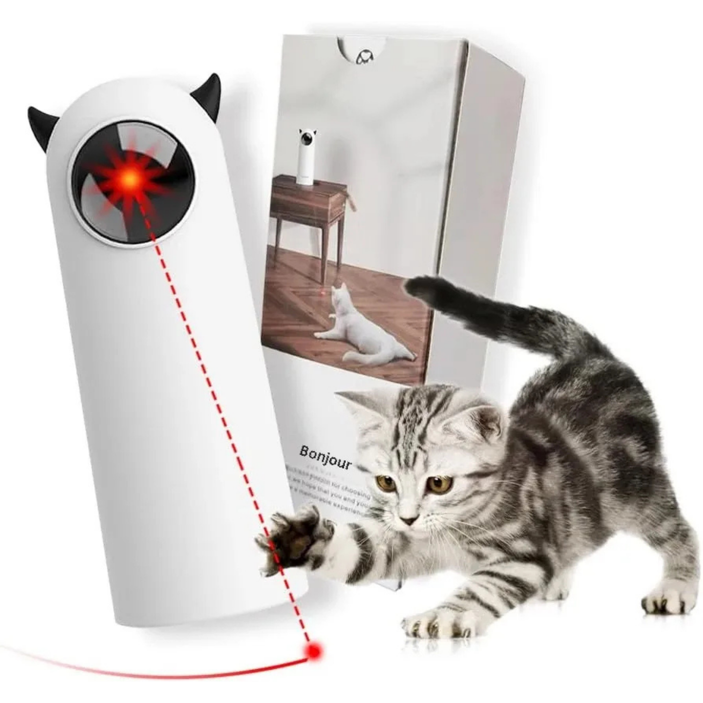 Jouet laser automatique pour chat au design minimaliste blanc avec oreilles de diable noires, présenté avec son emballage et un chaton tigré jouant avec le point rouge projeté au sol.
