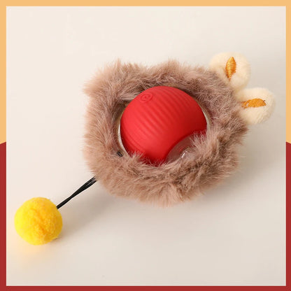 Jouet pour chat interactif avec balle motorisée rouge en silicone strié et housse en peluche marron douce. Ce jouet chat automatique est équipé d'une tige flexible avec un pompon jaune pour stimuler l'instinct de prédation. Un accessoire technologique unique parmi les jouet animaux pour offrir un exercice physique complet et autonome à votre félin.