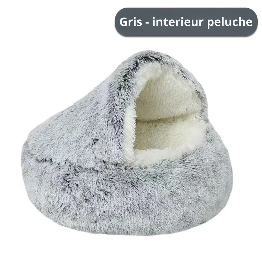 Panier grotte apaisant pour chat en peluche longue bicolore grise et blanche, doté d'un intérieur ultra-moelleux et d'un toit souple protecteur pour un sommeil sécurisant.
