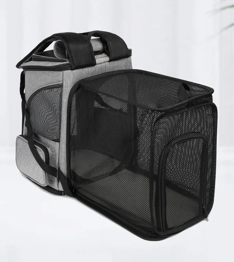 Sac à dos de transport pour chat gris chiné avec extension tente panoramique déployée en maille filet noire, offrant un large espace de repos aéré et sécurisé pour l'animal.