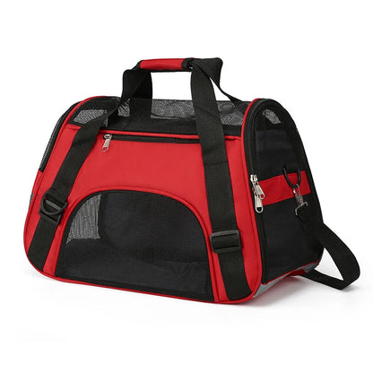 Sac de transport souple pour chat rouge et noir avec larges fenêtres en maille respirante, bandoulière d'épaule réglable et poignées confortables pour un voyage sécurisé.