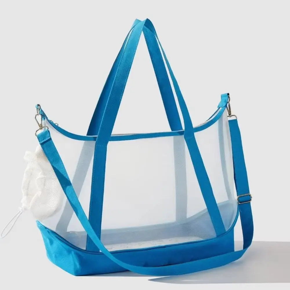 Sac de transport transparent pour chat bleu électrique type tote bag avec vue panoramique, comprenant de grandes anses, une bandoulière d'épaule réglable et un filet de protection blanc.