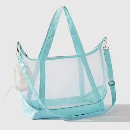 Sac de transport transparent pour chat bleu turquoise type tote bag avec vue panoramique, comprenant de grandes anses, une bandoulière d'épaule réglable et un filet de protection souple.