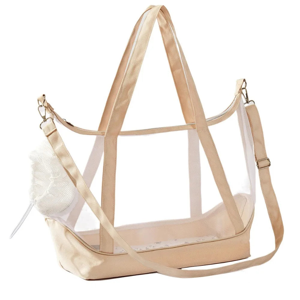 Sac de transport transparent pour chat beige sable type tote bag avec vue panoramique, comprenant de grandes anses, une bandoulière d'épaule réglable et un filet de protection blanc.