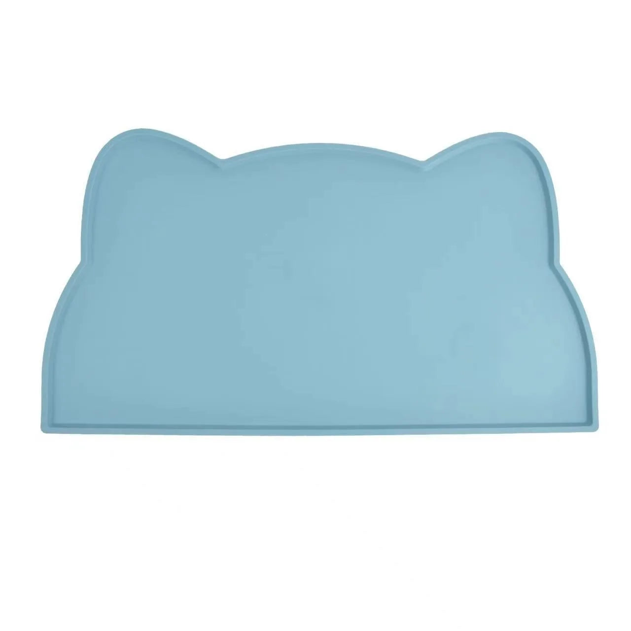 Photographie de face sur fond blanc du tapis gamelles chat en silicone bleu azur de la marque Les Trésors d'Owka. Ce tapis chat arbore un design original en forme de tête de félin avec des bords surélevés conçus pour stopper les débordements d'eau et de nourriture. Fabriqué en silicone alimentaire antidérapant et imperméable, ce tapis gamelles protège efficacement vos parquets et carrelages tout en facilitant l'entretien du coin repas. Sa couleur bleue pastel et sa finition mate en font un accessoire de dom